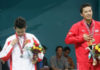Taufik Hidayat beats Lin Dan 21-15, 22-20 to win the 2006 Asian Games men's singles title in Doha.